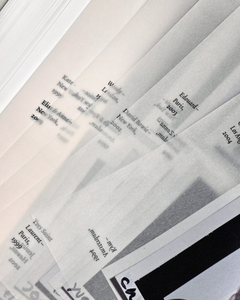 Close-up of multiple translucent printed sheets layered inside Inez & Vinoodh: Can Love Be a Photograph.