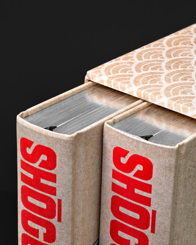 Detail of the two Shōgun volumes inside the cloth-covered slipcase, with printed spines and silver top edges.