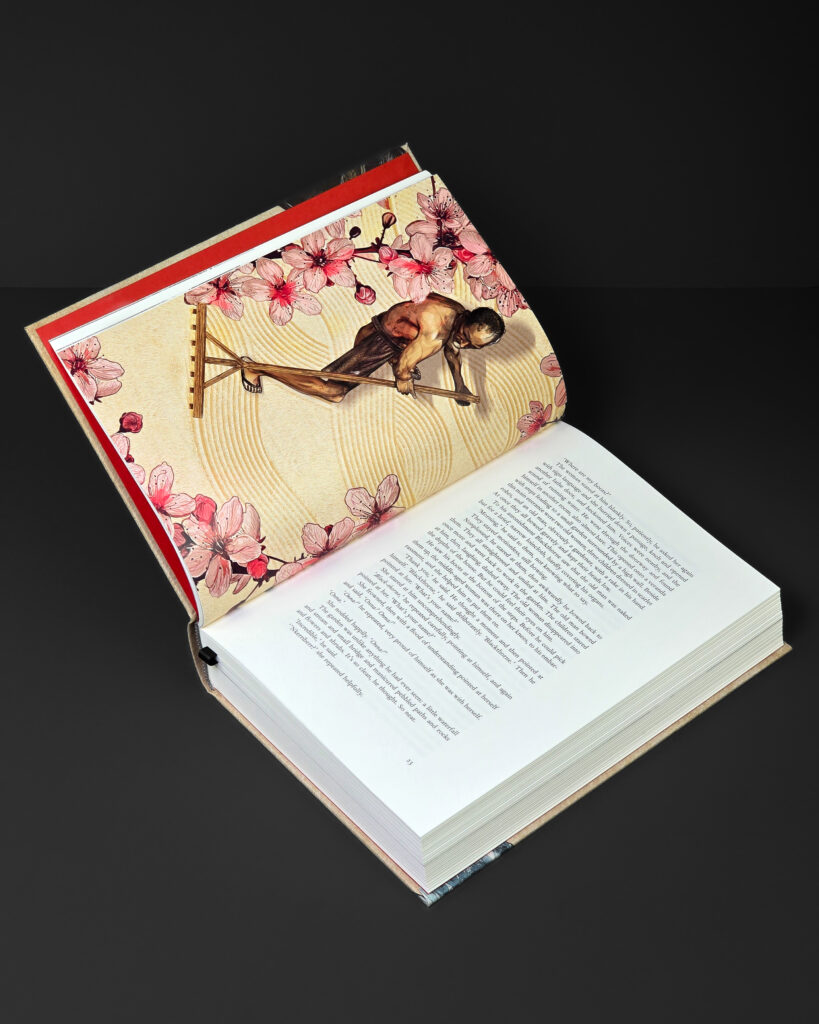 Open Shōgun volume showing a colour illustration with Japanese-inspired imagery alongside the text.