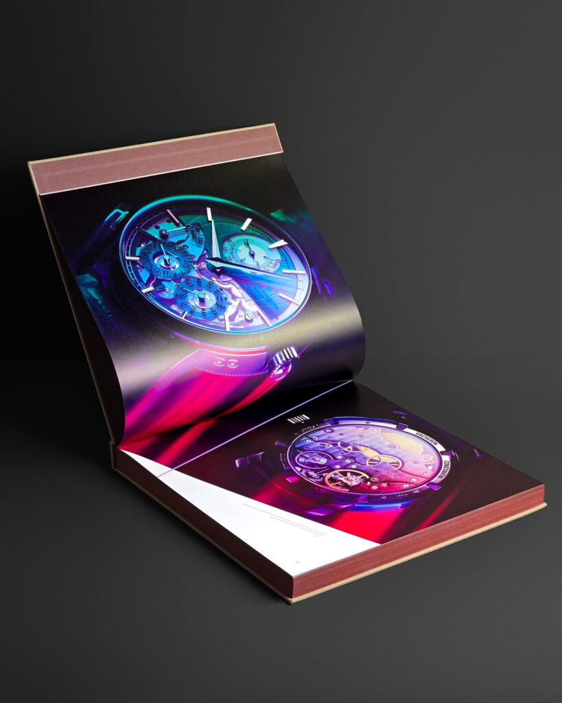 Open spread from Vacheron Constantin: Time is Art showing vivid watch photography in blue, violet and red tones.