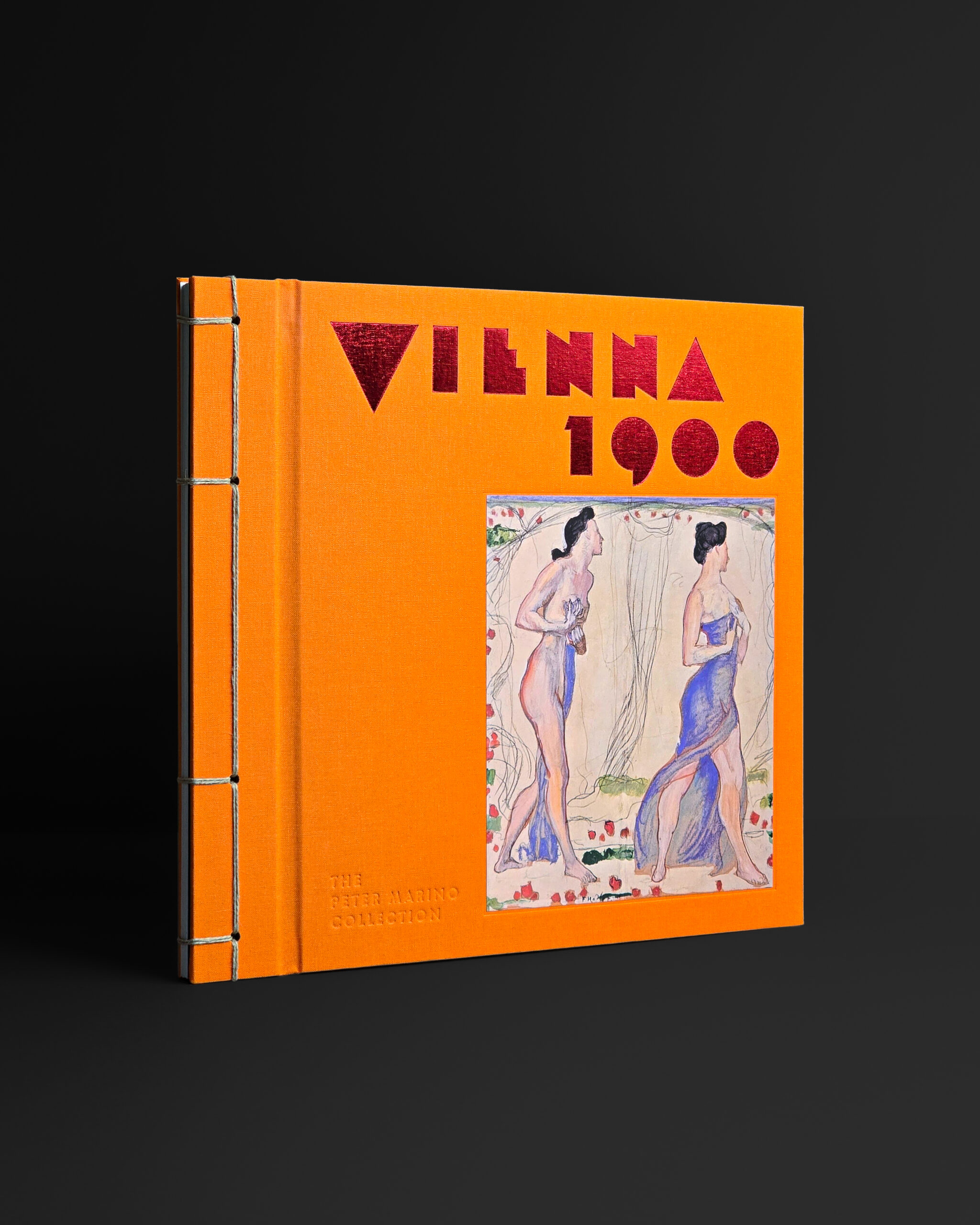 Vienna 1900: The Peter Marino Collection with orange cloth cover, metallic red title and applied artwork.