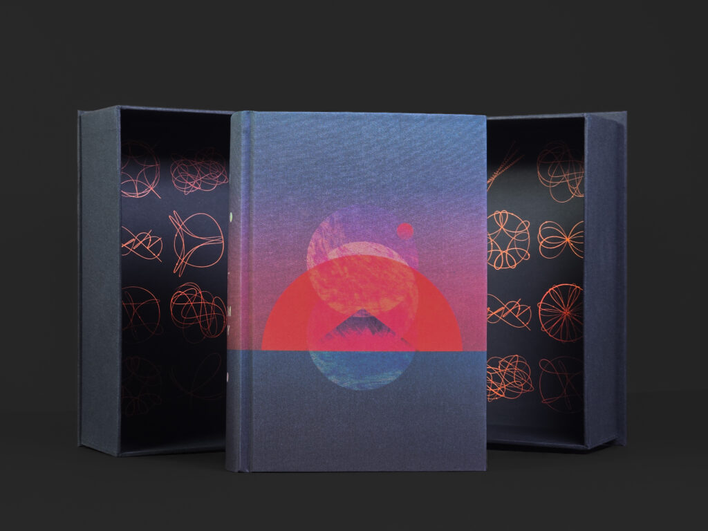 The Three-Body Problem Trilogy limited edition displayed with its open cloth-covered clamshell case.