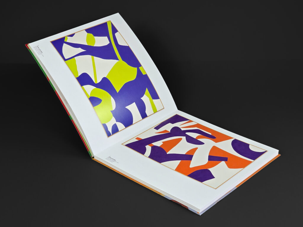 Interior panels of the Carla Accardi section featuring brightly coloured abstract works reproduced on heavyweight paper.